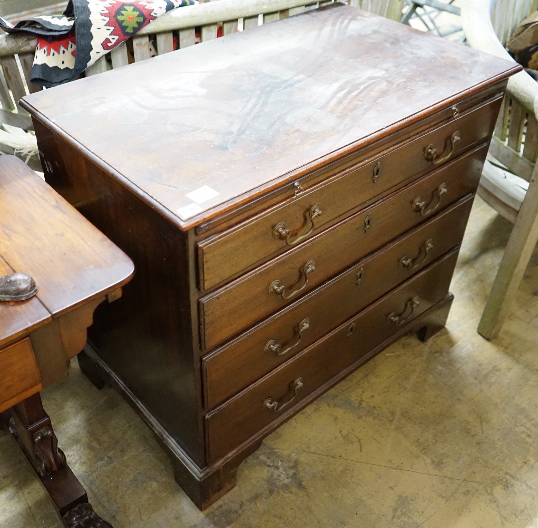 A George III mahogany four drawer chest, fitted slide, width 91cm, depth 53cm, height 80cm